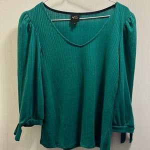 W5 Long Sleeve shirt. Size Small. New without tags. V neck. Green. Tie on sleeve